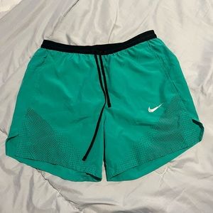 Nike Running Division shorts small